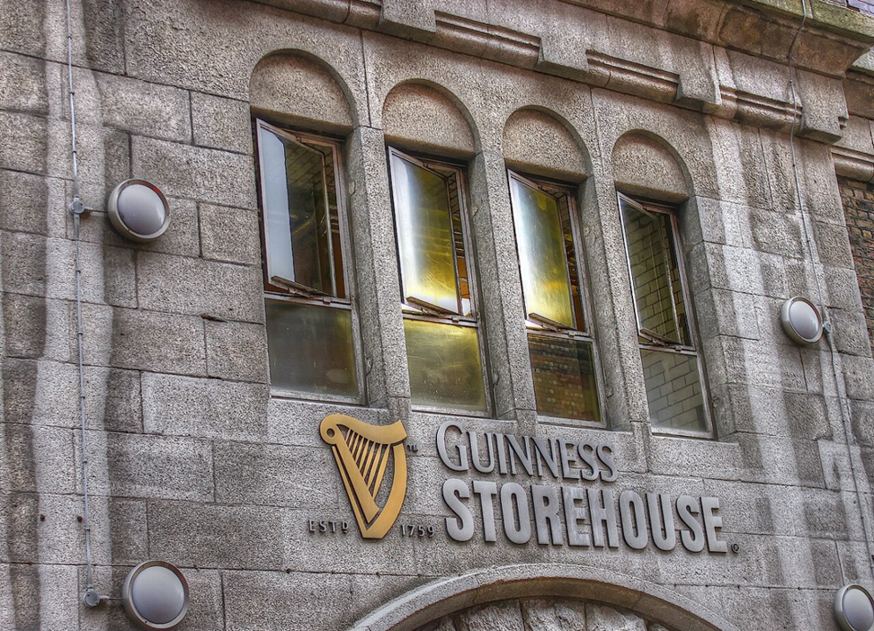 The Guinness Storehouse lettering on the stone entrance facade
