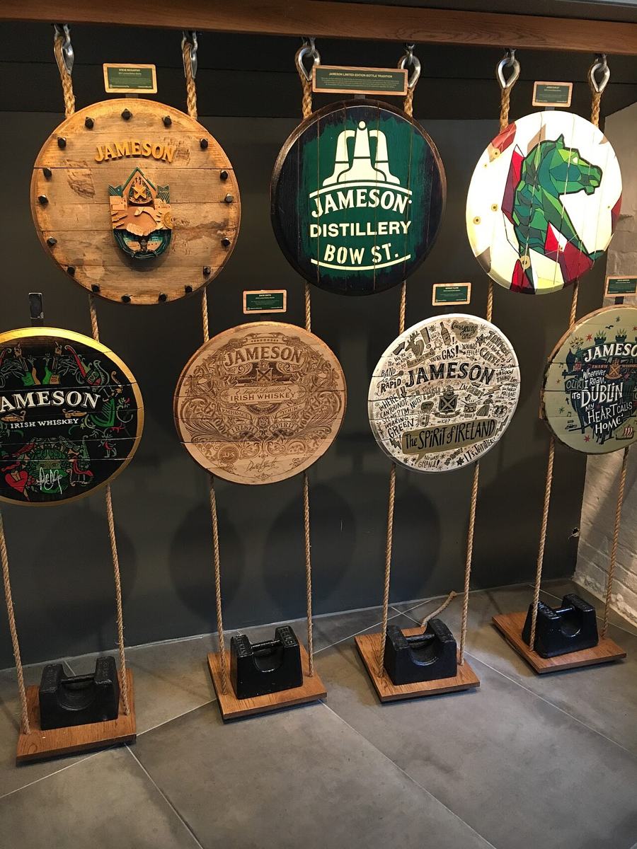 A display of decorated whiskey barrel ends at Jameson Distillery Bow St