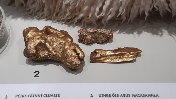 Three gold nuggets displayed at the National Museum of Ireland Archaeology
