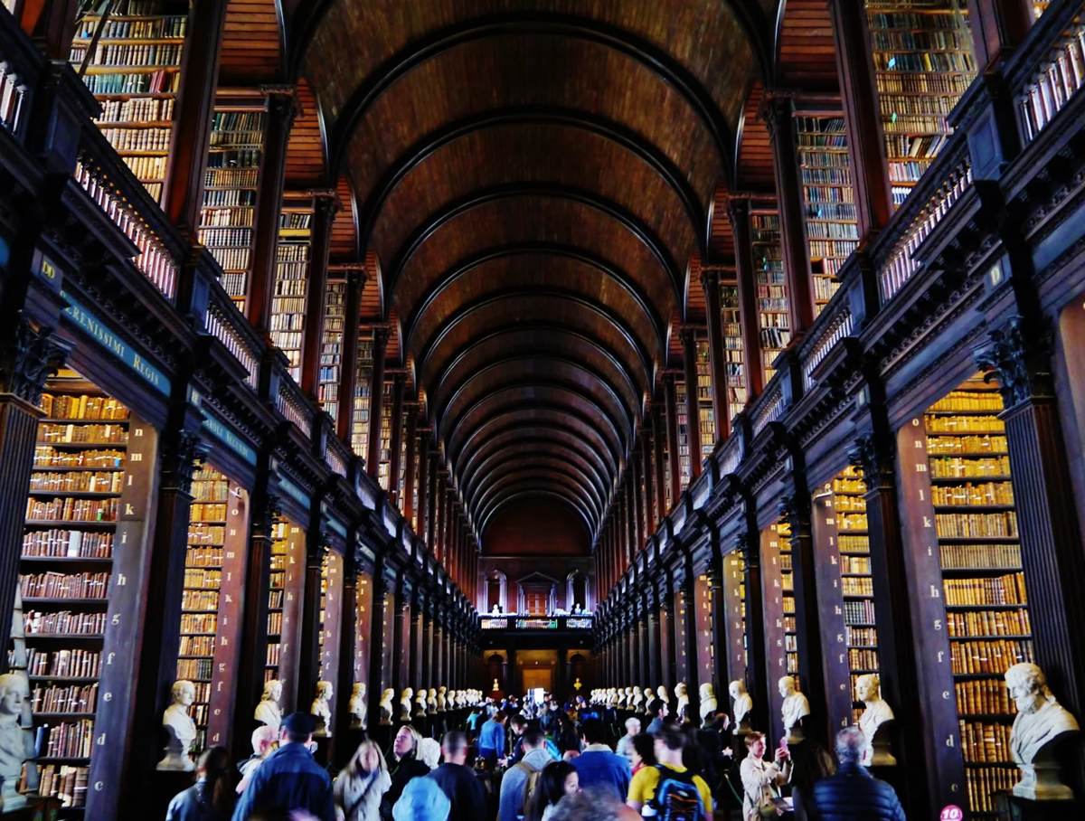 Historic 2022 view down the book-lined Long Room at Trinity College Dublin