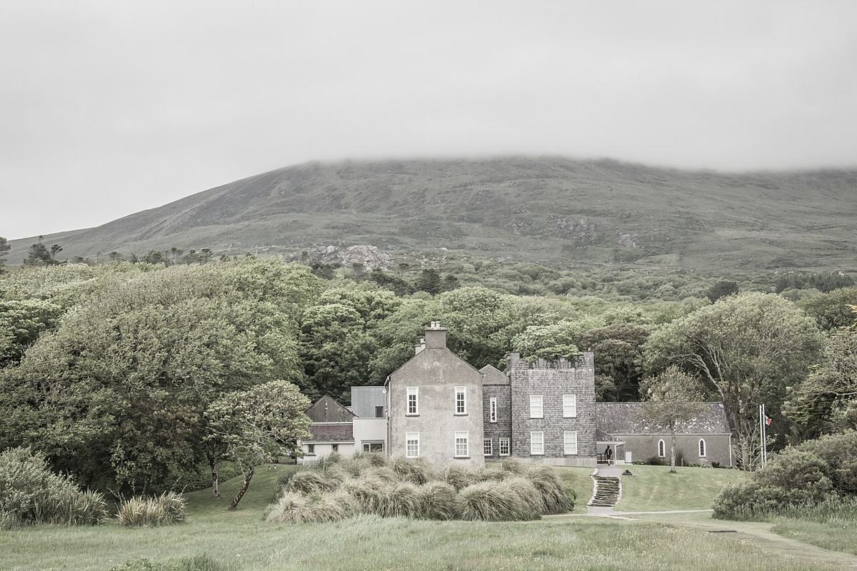 Derrynane House seen across its landscaped grounds