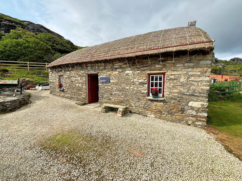 Dooey Cottage with its thatched roof at Glencolmcille Folk Village