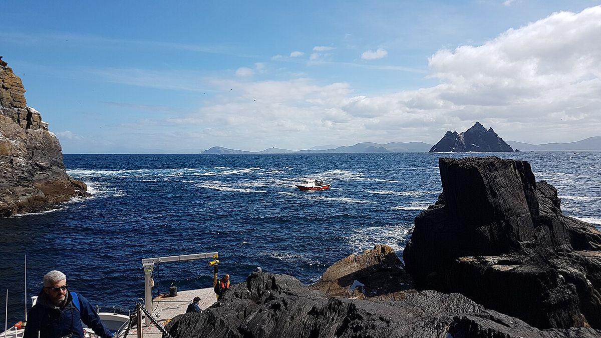 The jetty on Skellig Michael with boats and the sea beyond