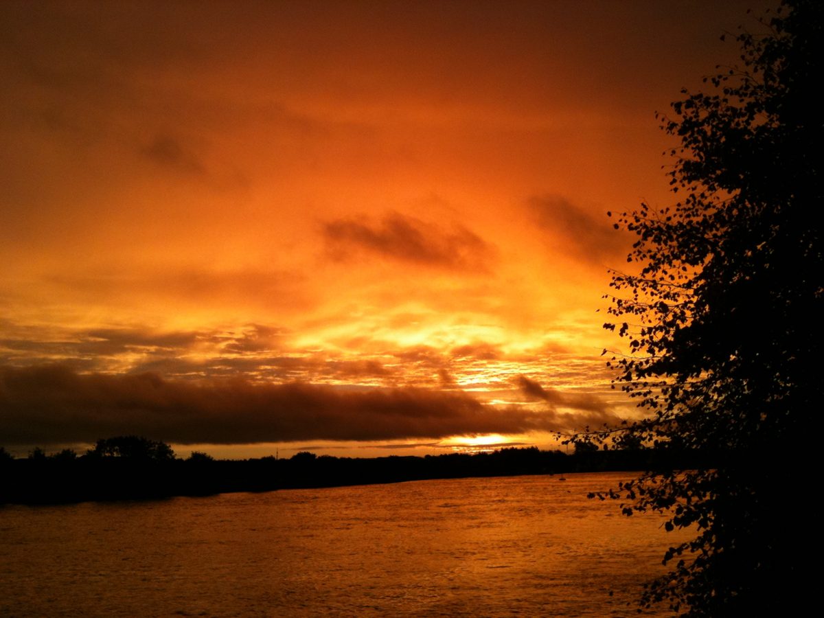 Sunrise across the River Corrib in March 2011; a nearby river view rather than a marked entrance