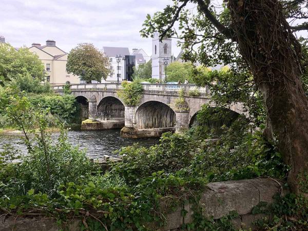 The older stone Salmon Weir Bridge in August 2018