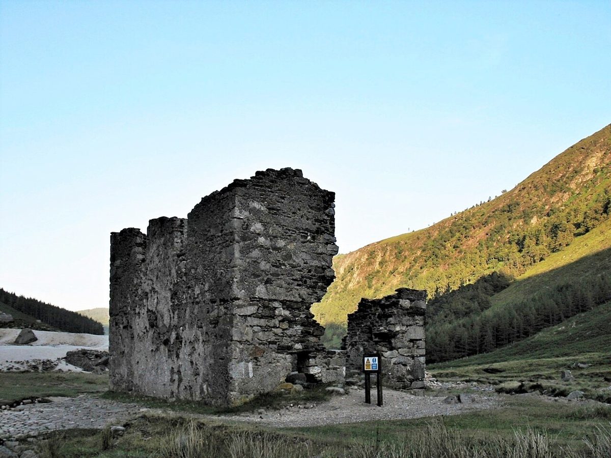 Abandoned stone buildings at Glendalough Miners’ Village