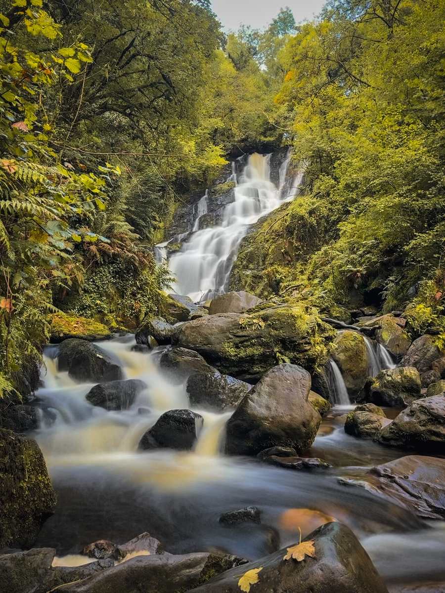 Water flowing over rocks at Torc Waterfall