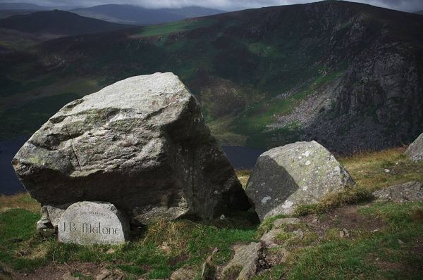 The J.B. Malone memorial stone above Lough Tay