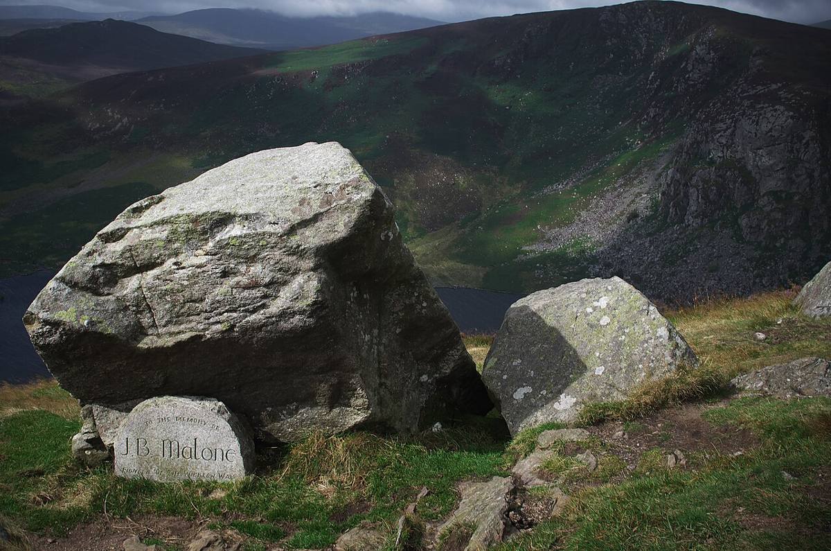 The J.B. Malone memorial stone above Lough Tay