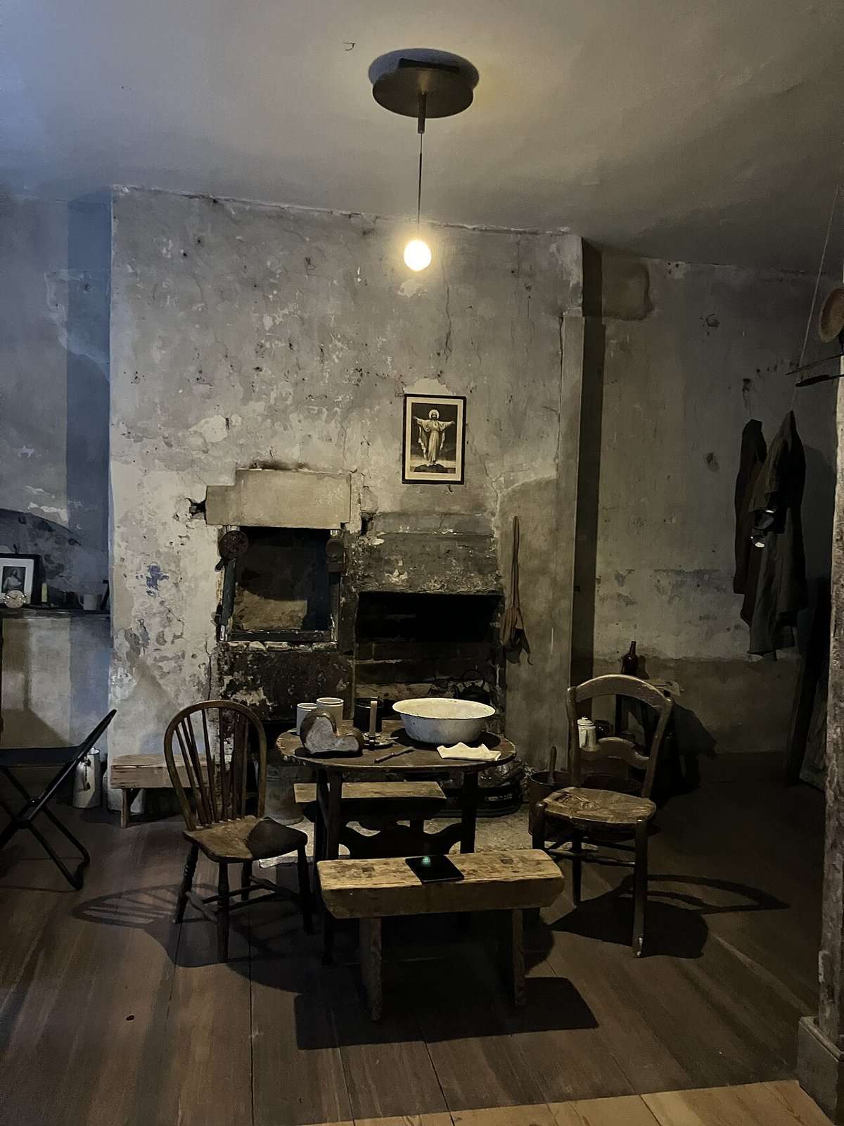 Basement exhibition room with table and chairs at 14 Henrietta Street