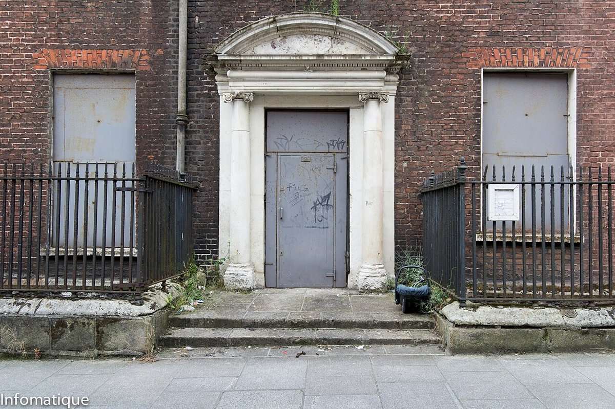 Historical doorway and brick facade at 14 Henrietta Street