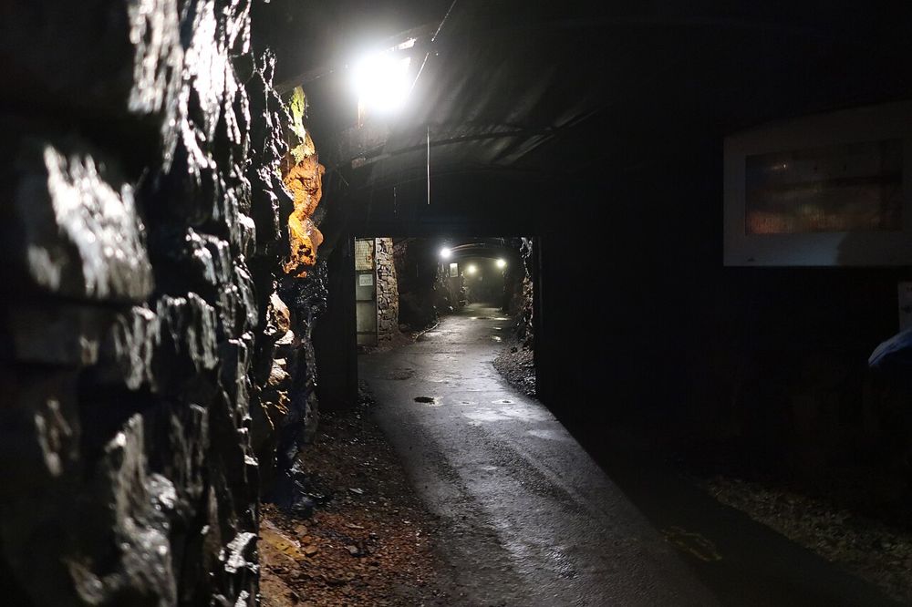 A lit passage through the former mine at Arigna Mining Experience