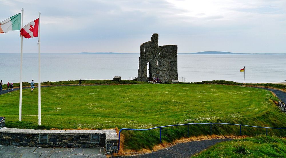 Ballybunion Castle remains above the coastal setting