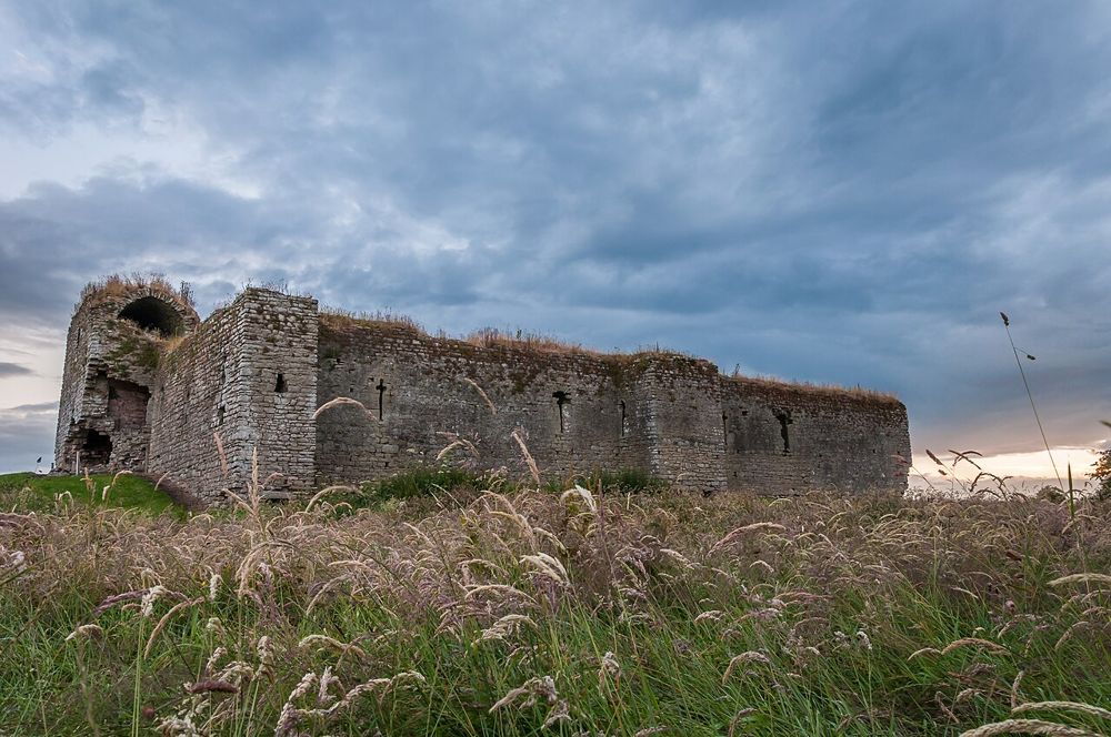 Ballymoon Castle’s low stone enclosure at sunset