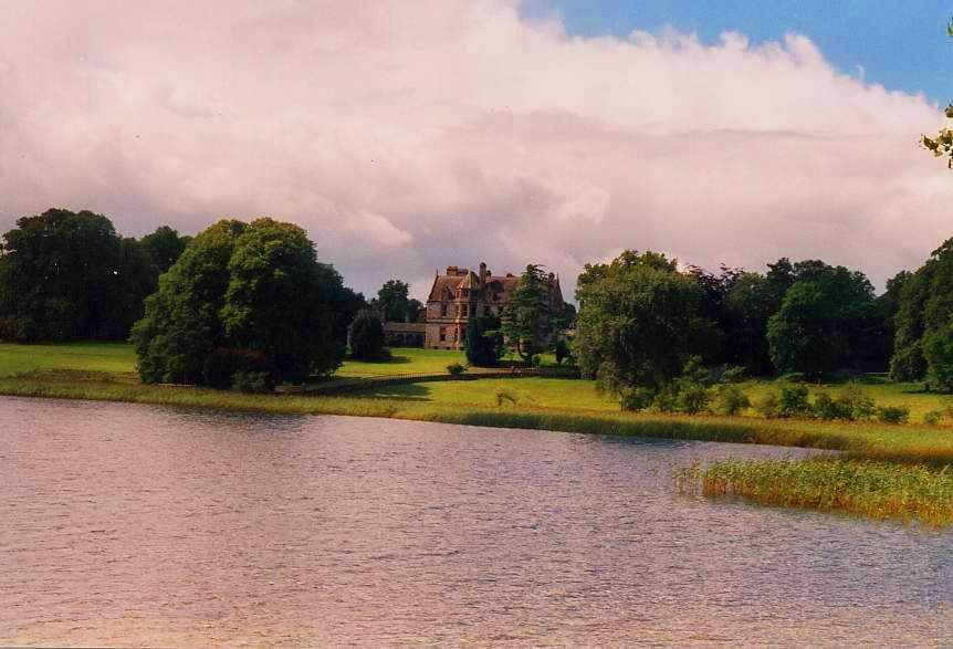 Castle Leslie seen across the lake in a 1999 photograph
