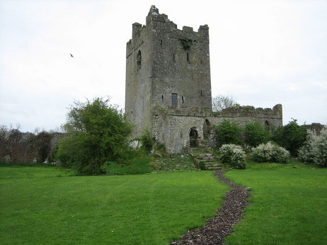 Clonony tower house seen across the grass