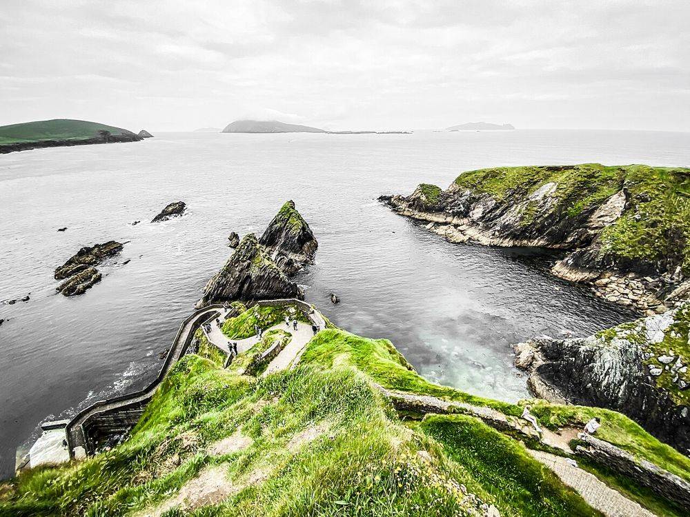 The winding descent to Dunquin Pier beneath the cliffs