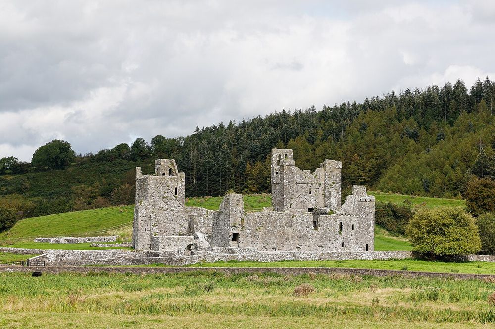 Ruined ranges of Fore Abbey in the surrounding valley