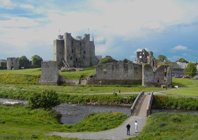 The stone keep and surrounding walls of Trim Castle, with lawns in the foreground