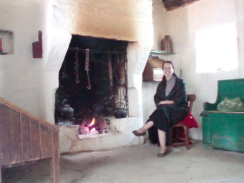 A hearth inside a reconstructed period home at the Ulster American Folk Park