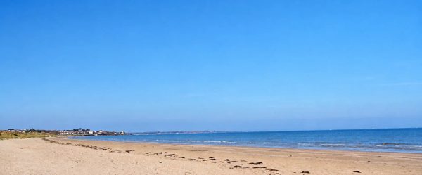 AI illustration of Portmarnock Velvet Strand based on a credited source photograph