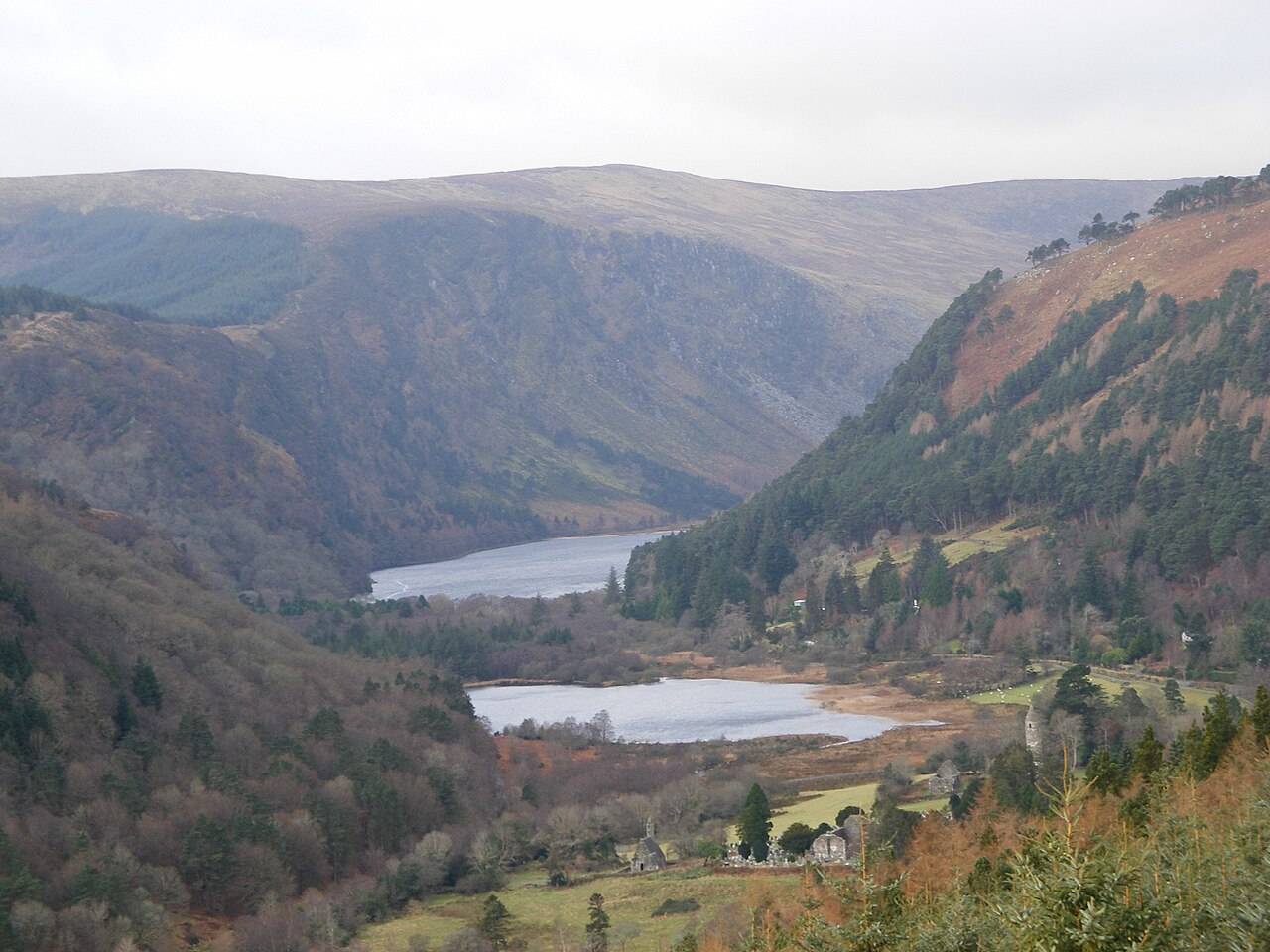 Wide view of the Glendalough valley and its two lakes