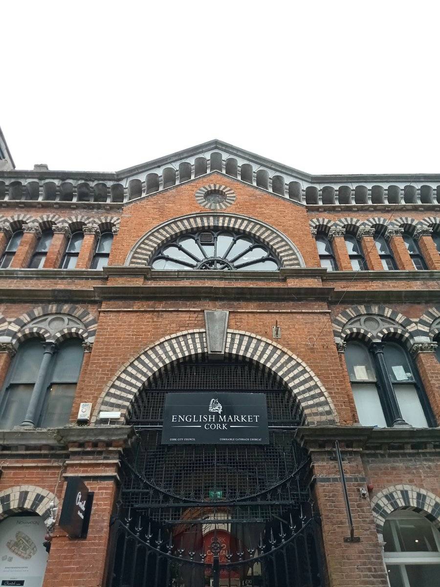 Brick and stone entrance facade of the English Market in Cork