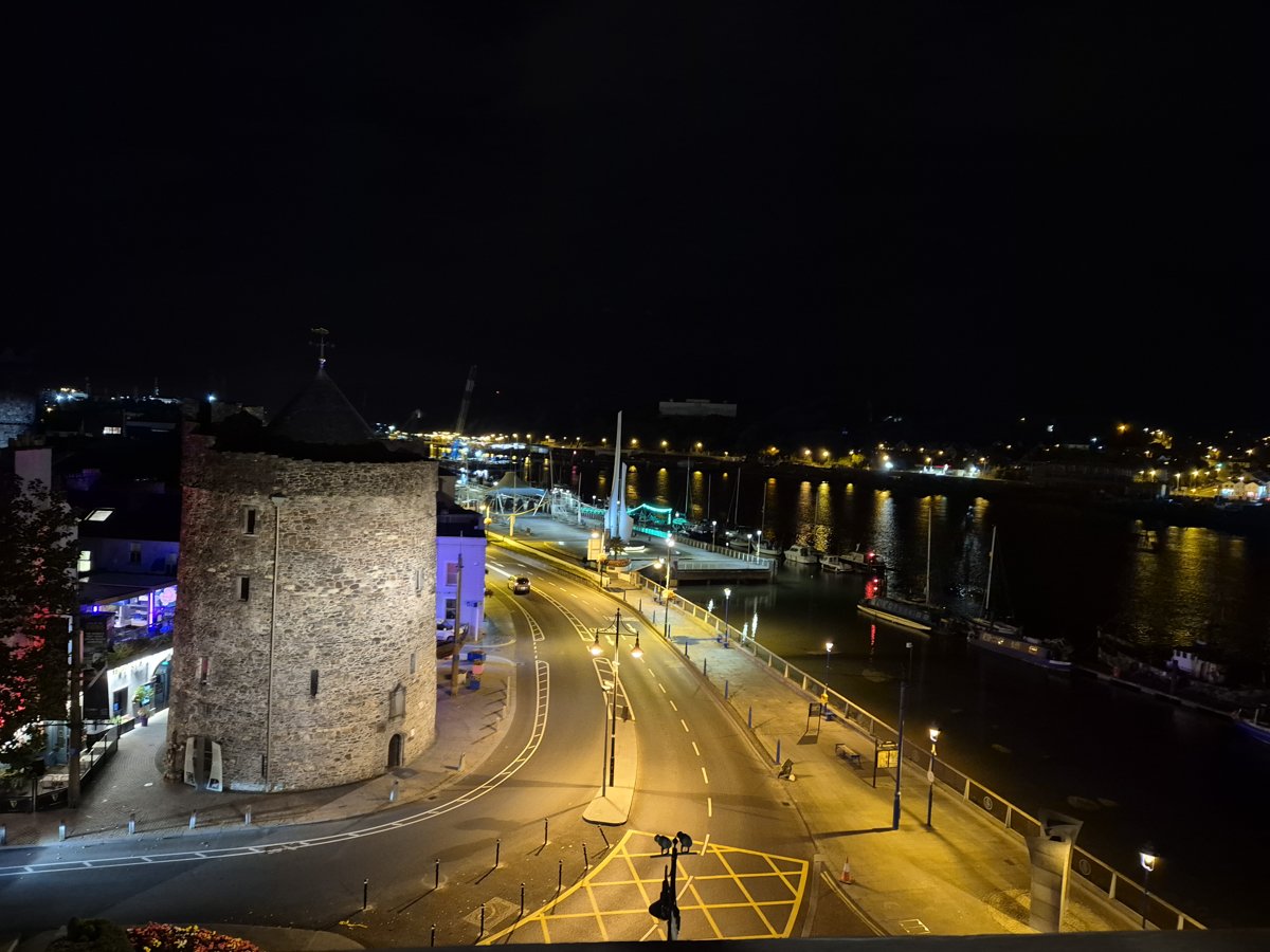 Reginald’s Tower and the riverfront lit at night