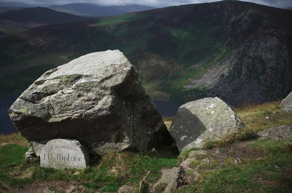 The J.B. Malone memorial stone above Lough Tay