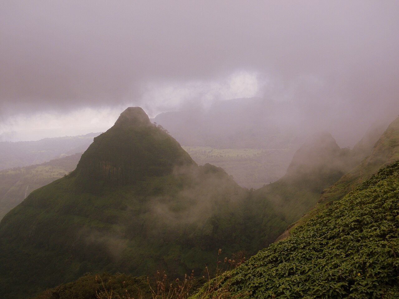 Clouds around a hill in the Lonavala area